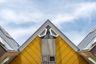 Rotterdam, Netherlands - April 23, 2019 : Yellow Cube houses - Kubuswoningen - in Blaak station area famous landmark of the city