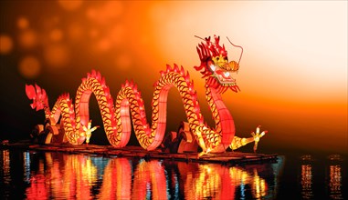 Chinese new year dragon lanterns on pond in china town