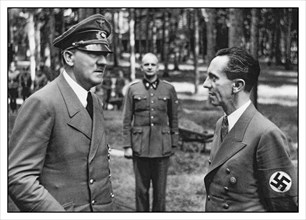 Adolf Hitler &  Reichminister Dr Joseph Goebbels with Nazi swastika armband at the Wolf’s Lair Headquarters.Poland. Hitler and Goebbels at the Wolf's Lair shortly after the beginning of Operation Barb...