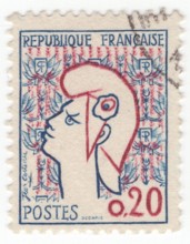 FRANCE - 1961  February 23: An 20 centimes blue and carmine postage stamp postage stamp depicting Marianne — national personification of the French Republic since the French Revolution, as a personifi...